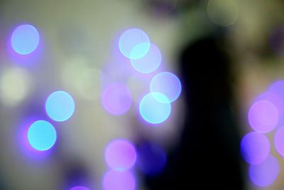 Defocused image of illuminated christmas lights