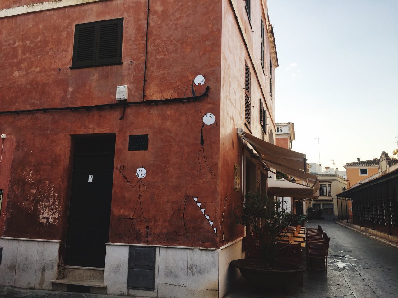 STREET AMIDST BUILDINGS IN CITY