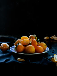 Close-up of fruits in bowl on table