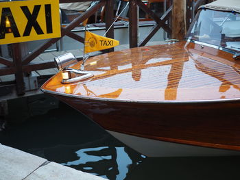 High angle view of text on boat in city