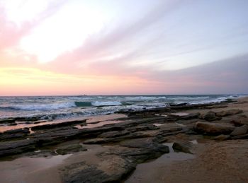 Scenic view of sea at sunset