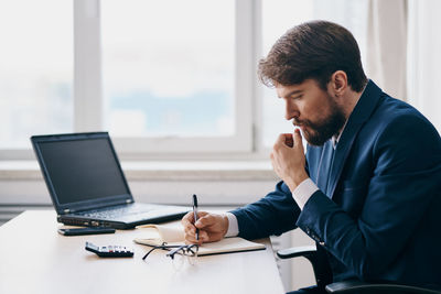 Young man using mobile phone