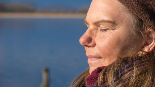 Close-up of woman with eyes closed