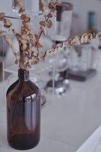 Close-up of wine bottles on table