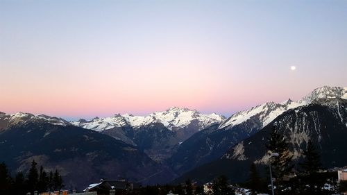 Scenic view of snowcapped mountain against sky