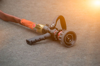 Close-up of fire hose on street