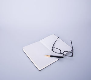 High angle view of decoration on table against white background