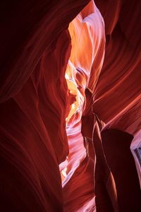 Low angle view of red rock formation