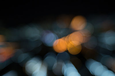 Defocused image of illuminated lights at night