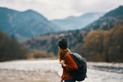 Rear view of man looking at mountain