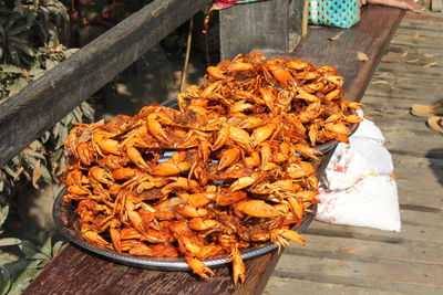 High angle view of cooked crabs for sale at market