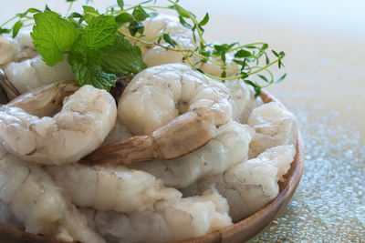 Close-up of shrimps in bowl on table