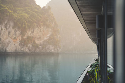 Scenic view of lake seen through window