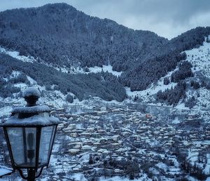 Scenic view of mountains against sky during winter