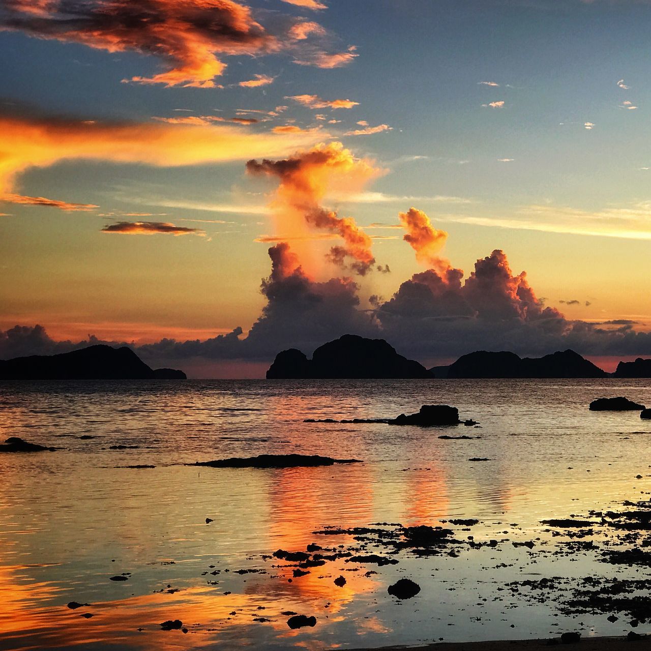 sunset, scenics, beauty in nature, sky, orange color, nature, tranquil scene, water, sea, tranquility, cloud - sky, no people, silhouette, outdoors, beach, mountain