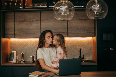 Mom and daughter in the kitchen