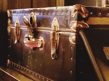 Close-up of padlocks on metal