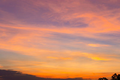 Low angle view of dramatic sky during sunset