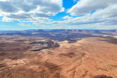 View of landscape against cloudy sky