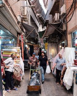 People at market stall