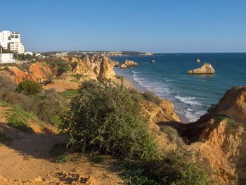 Scenic view of calm sea against clear sky