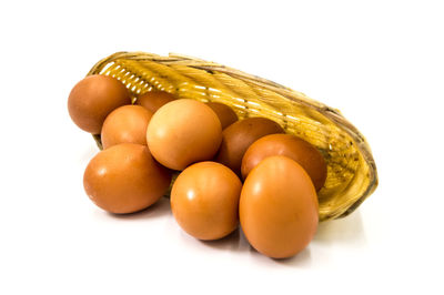 Close-up of oranges on white background