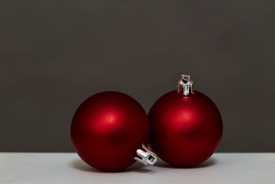 Close-up of tomatoes on table against black background