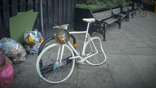 Close-up of bicycle against wall