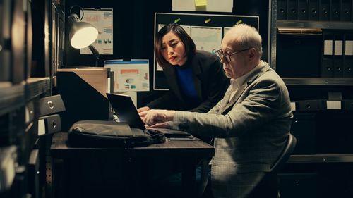 Young woman using laptop at home