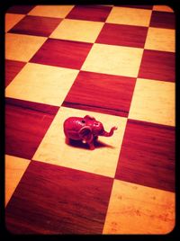 Close-up of red shoes on floor