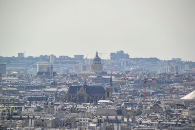 High angle view of buildings in city against clear sky