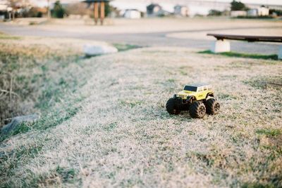 Close-up of toy car on grass