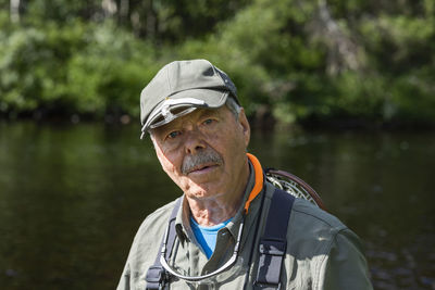 Senior man looking at camera