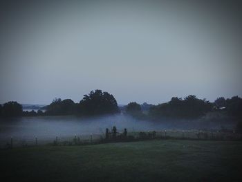 View of landscape against cloudy sky