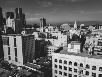 High angle view of buildings in city against sky