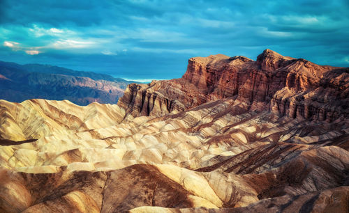 Scenic view of rocky mountains against sky