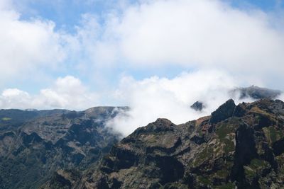 Scenic view of rocky mountains against sky