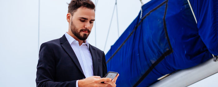 Young man using mobile phone