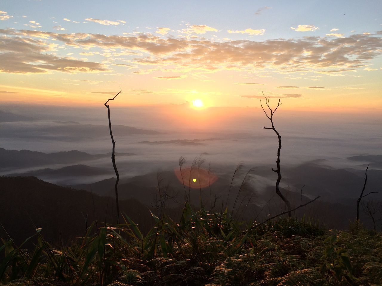 SCENIC VIEW OF SUNSET OVER LAND