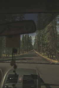 Road seen through car windshield