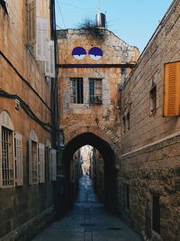 Archway amidst buildings in town