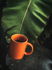 High angle view of coffee cup on table