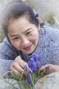 Portrait of a smiling young woman outdoors