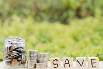 Close-up of coins on table