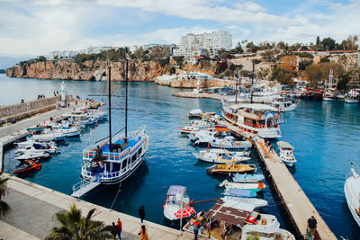 Boats moored at harbor