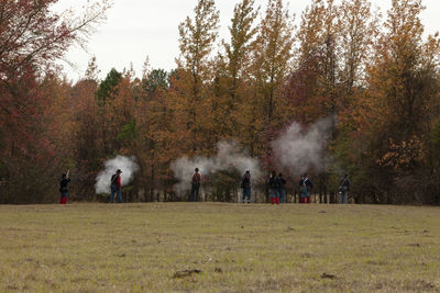 People on field during autumn