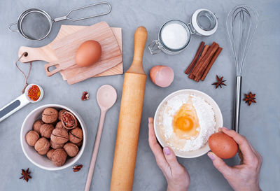 Pastry chef's workplace makes dough for pie. ingredients for baking on gray surface. 