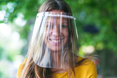 Portrait of smiling woman outdoors