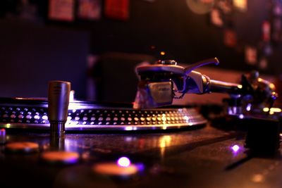 Close-up of guitar at night