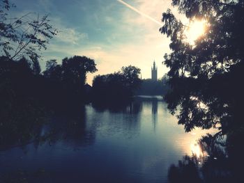 Scenic view of river at sunset